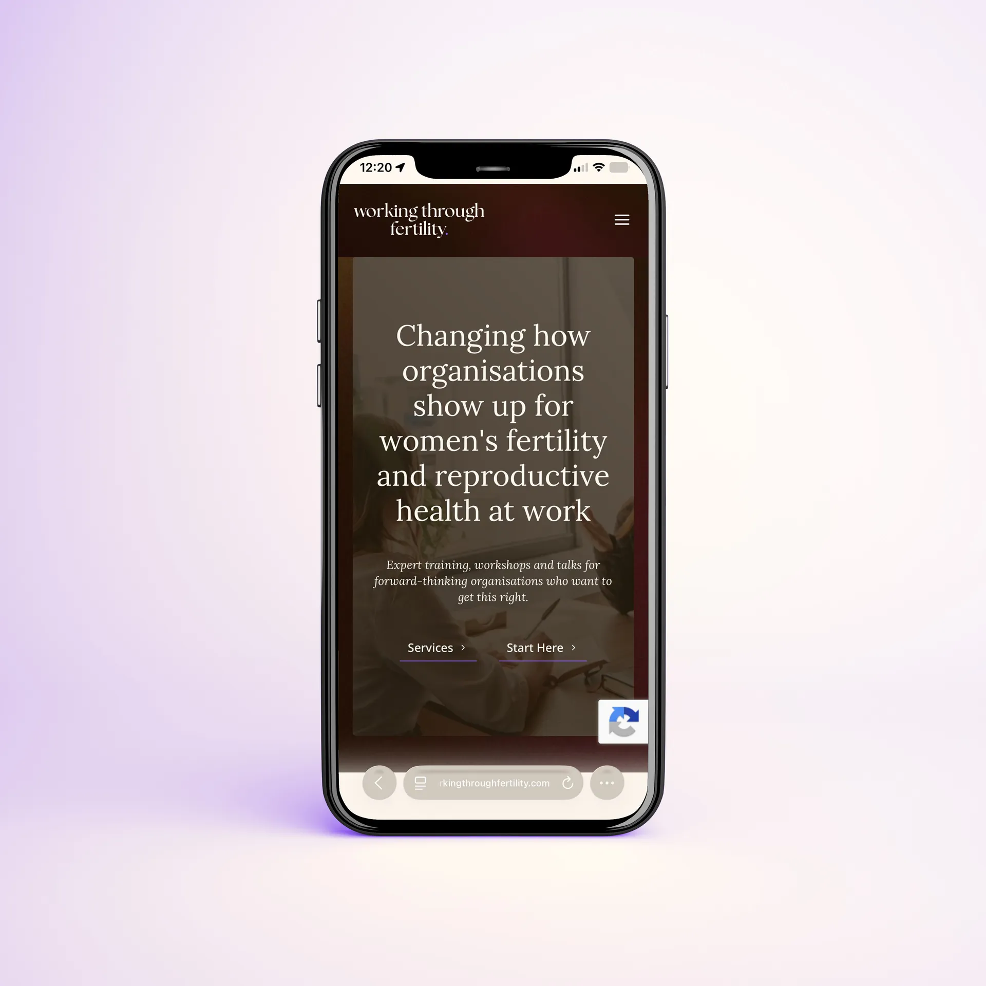 Working Through Fertility homepage on mobile in a phone mockup. web design by Berlew Design Studio.